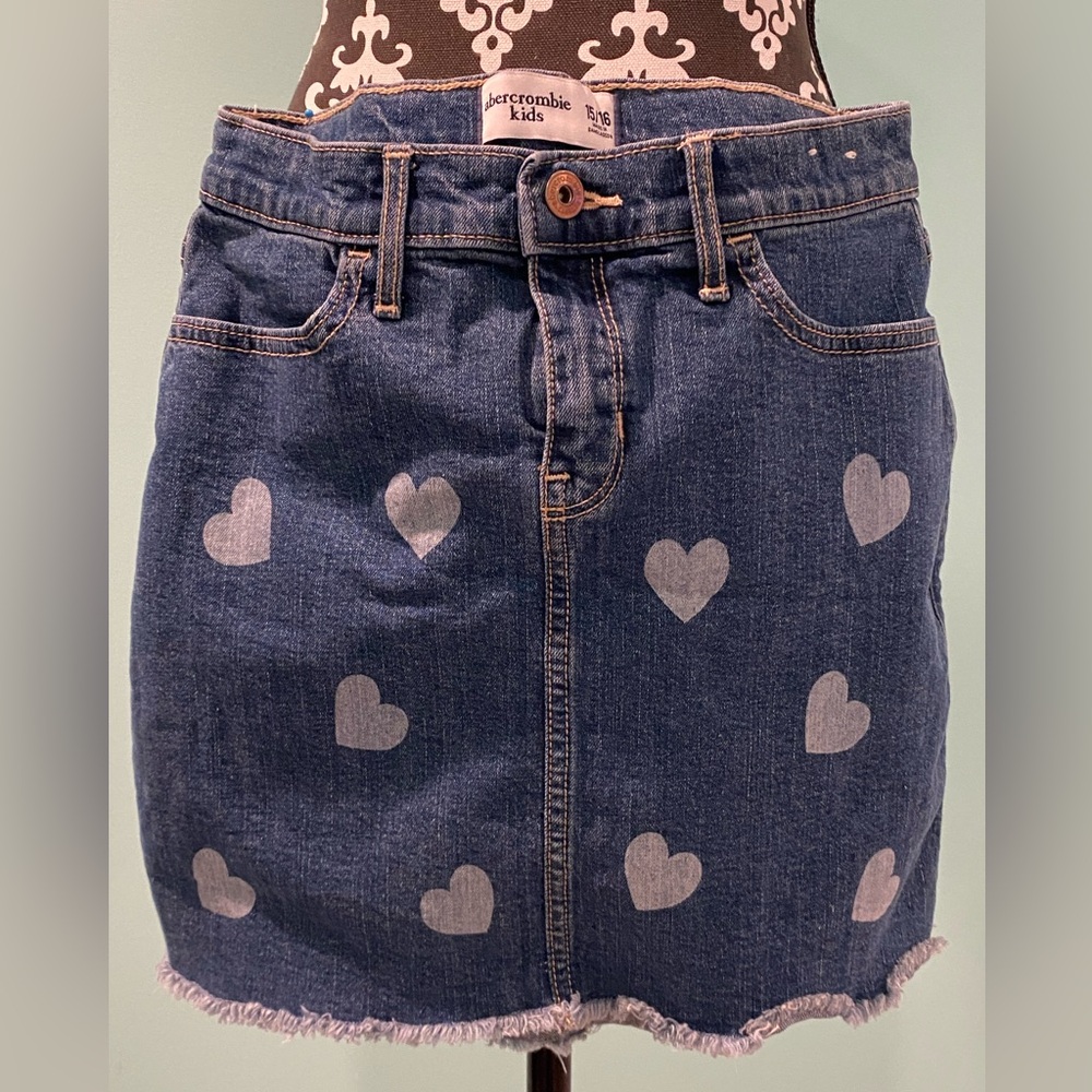Abercrombie Kids heart print denim skirt. Never Worn. Size Adjustable waistband.